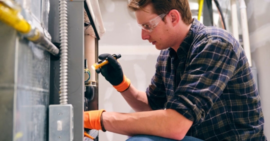 furnace technician providing tune-up